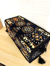 Navy armrest cushion in 100% cotton placed beside floor cushions for majlis-style ground seating
