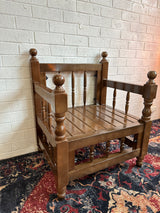 Dark-toned majlis seat showing rustic wood grain and 60 cm wide seat with deep 70 cm surface for relaxed sitting