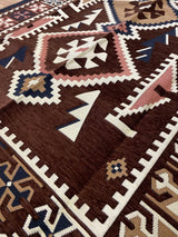 Close detail of the flat cotton weave and brown pattern on the washable Turkish kilim rug