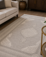 Close detail of Kervan AK187 gray Turkish rug pile texture showing 12 mm height and neutral machine weave