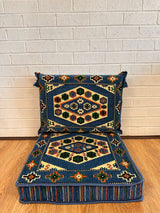 Blue classic floor cushion set with square cotton seat base and matching backrest arranged for low majlis seating