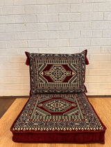 Dark red palace floor cushion set with ornate motif on deep red cotton seat base and matching backrest