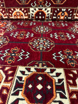 Close detail of maroon elegance floor cushion showing rich cotton weave and firm sponge filled seam edge