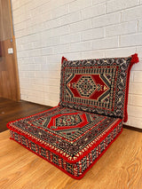 Two-piece red palace floor cushion set arranged for ornate, formal Turkish majlis floor seating