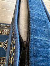 Close view of blue palace cotton cover showing the pattern and stitched edges on the floor cushion set