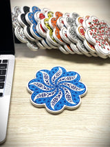 Handmade Turkish ceramic coasters showing artisan colour and craft, arranged as small decorative tabletop accents
