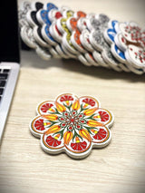 Set of Turkish ceramic coasters styled together to add artisan colour and heritage to a coffee or dining table